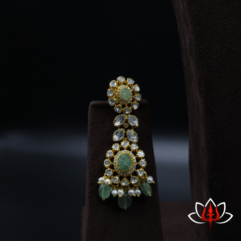 Silver Adorned with Sparkling Stones & Green Gem Drops